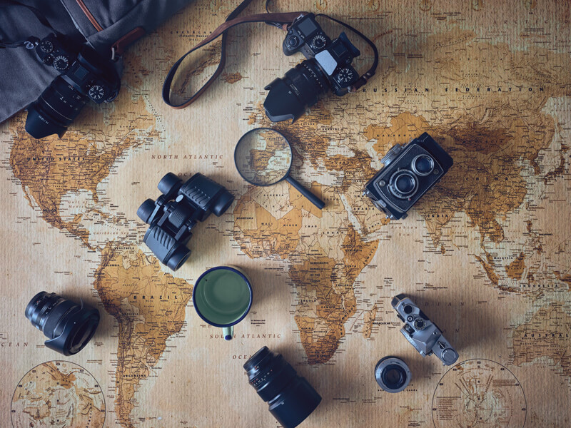 various-photo-cameras-on-world-map
